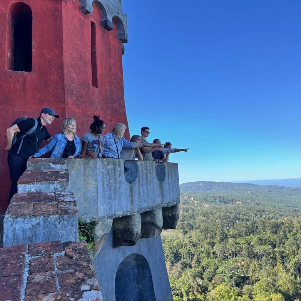 Readers pointing out the view from the red clock tower terrace of Pena Palace, Sintra